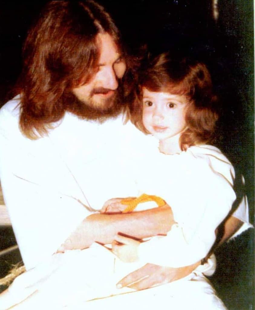 andrea as a child with her father